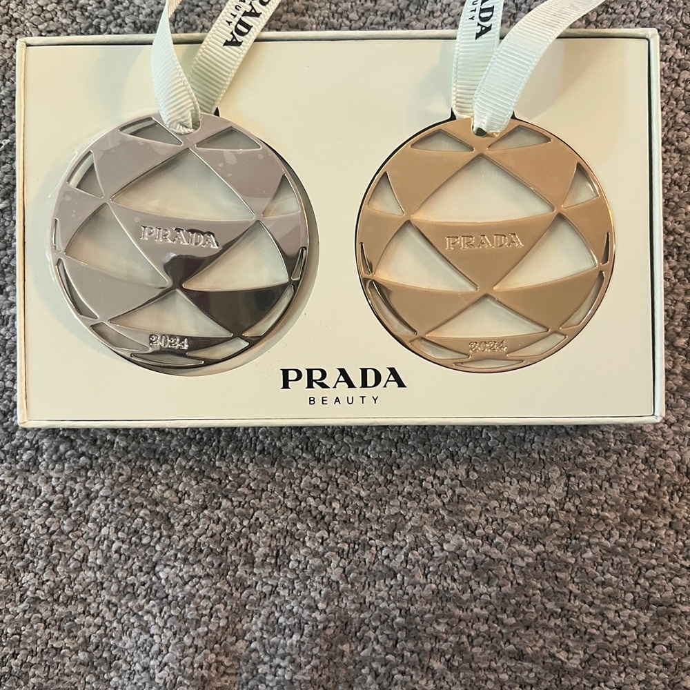 Prada Beauty Silver and Gold Discs